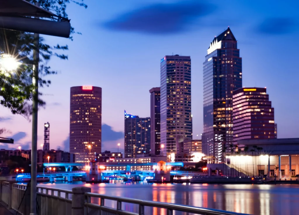Tampa Florida skyline at dusk along the Hillsborough River representing services from a Medical Marijuana Doctor in Tampa
